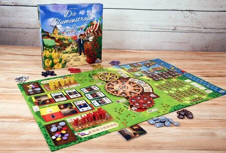 Die Blumenstraße: Das Duell Brettspiel mit Tulpenfeldern, Windmühlen, Farmtableaus und Spielmaterial zum Anbau und Handel